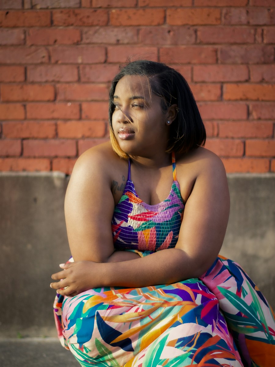 Woman in a bright tropical print two-piece